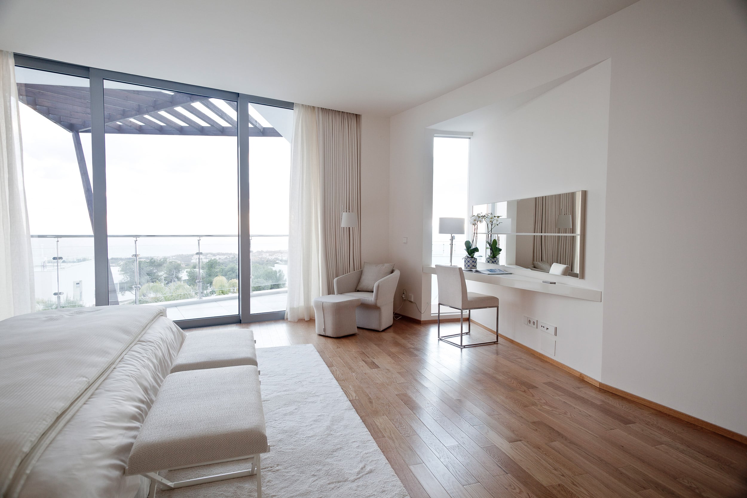 Bedroom with wooden floor that offers comfort and warmth.