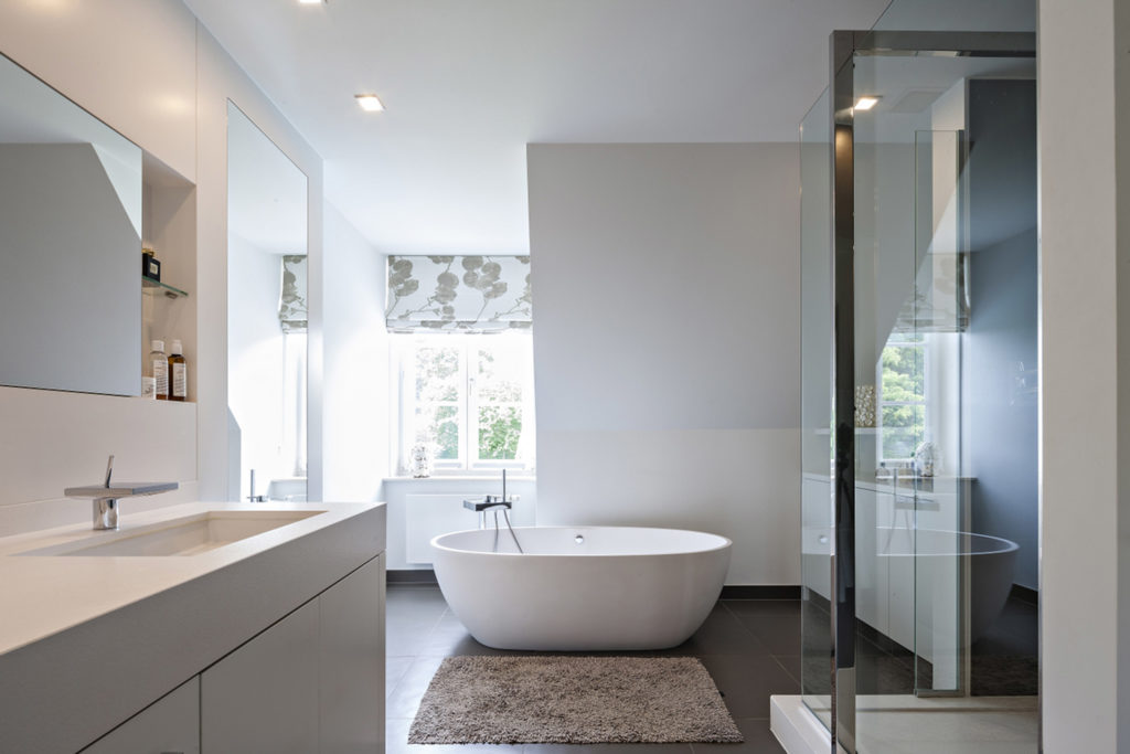 minimalist style bathroom in white with dark floor